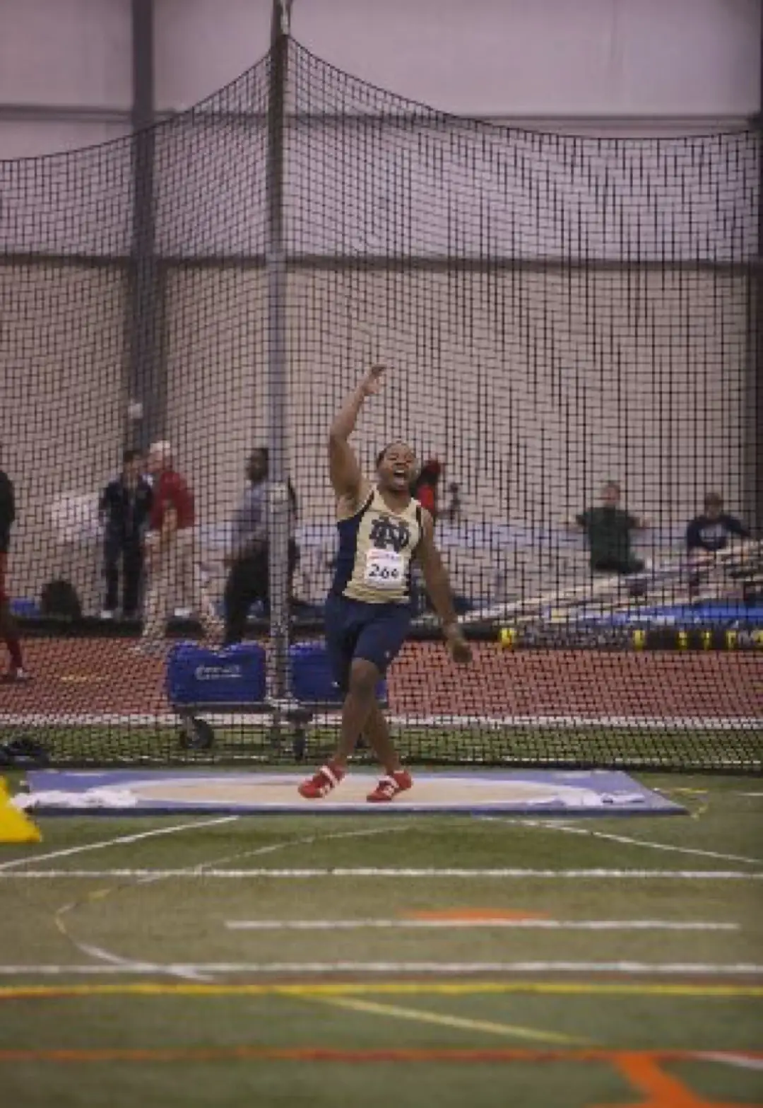 Metropolis alumnus Anthony Thomas competing in the discus.